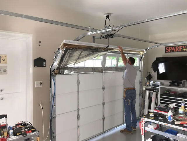 Garage door section replacement by Ravenna Garage Door Repair in Ravenna