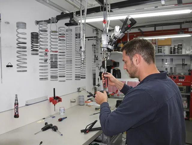 Ravenna Garage Door Repair safety certified technician performing precision spring replacement in Ravenna