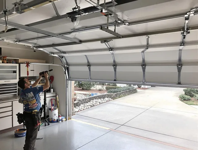 Garage door track repair service by Ravenna Garage Door Repair in Ravenna